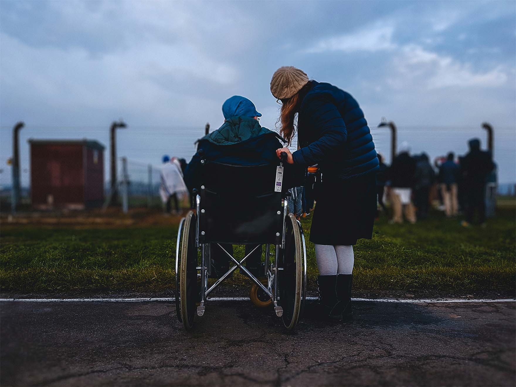 residents on a trip together with loved one point something out